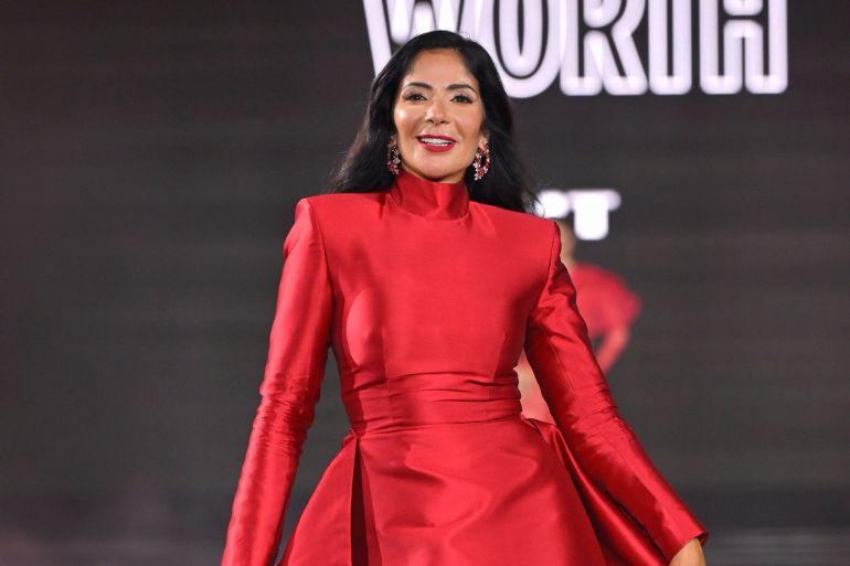 PARIS, FRANCE - OCTOBER 01: Mona Zaki walks the runway during